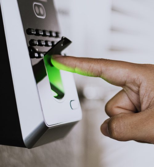 Scanning finger on a coronavirus contaminated fingerprint access control